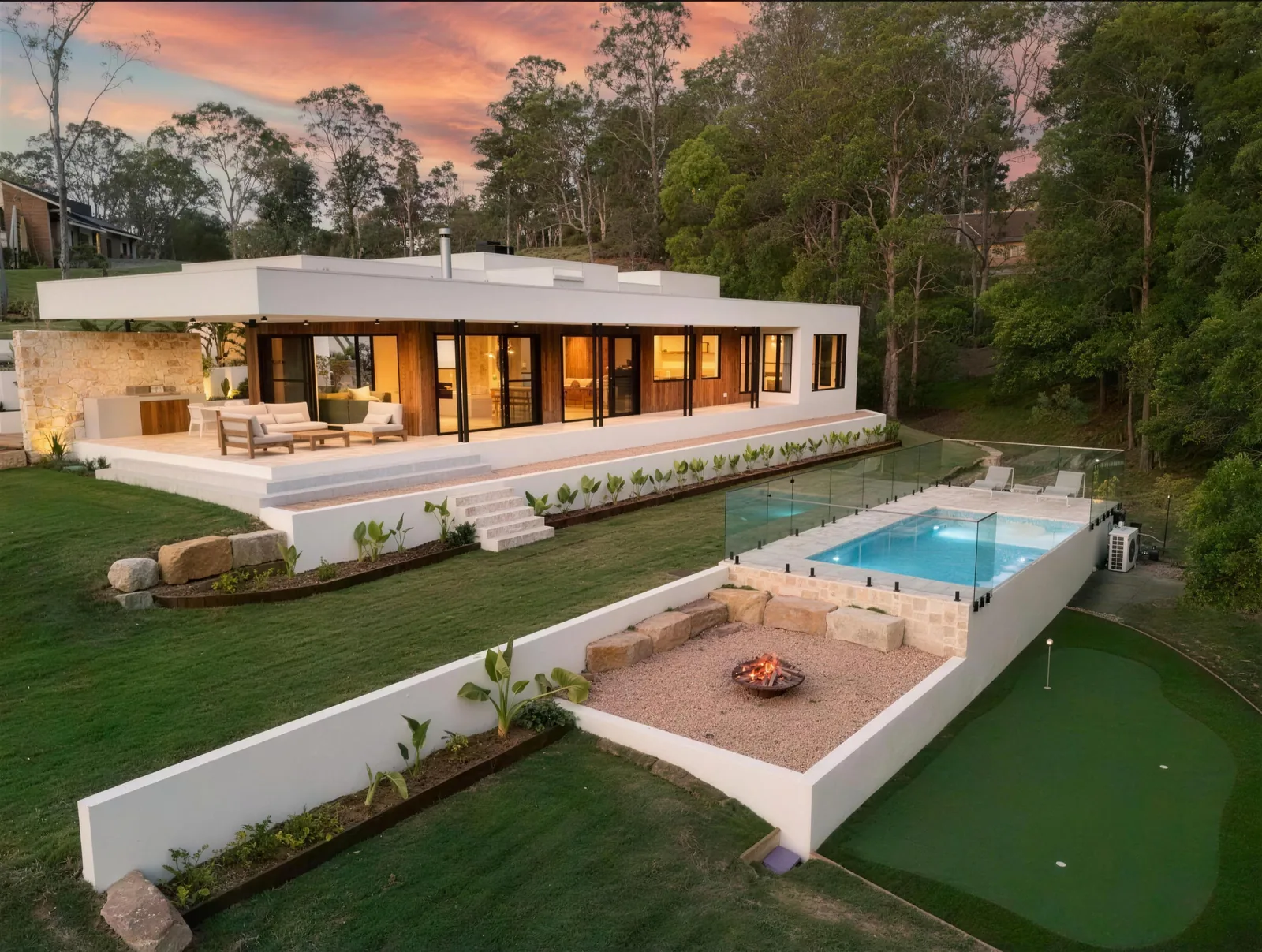 White rendered pool wall with tropical planting