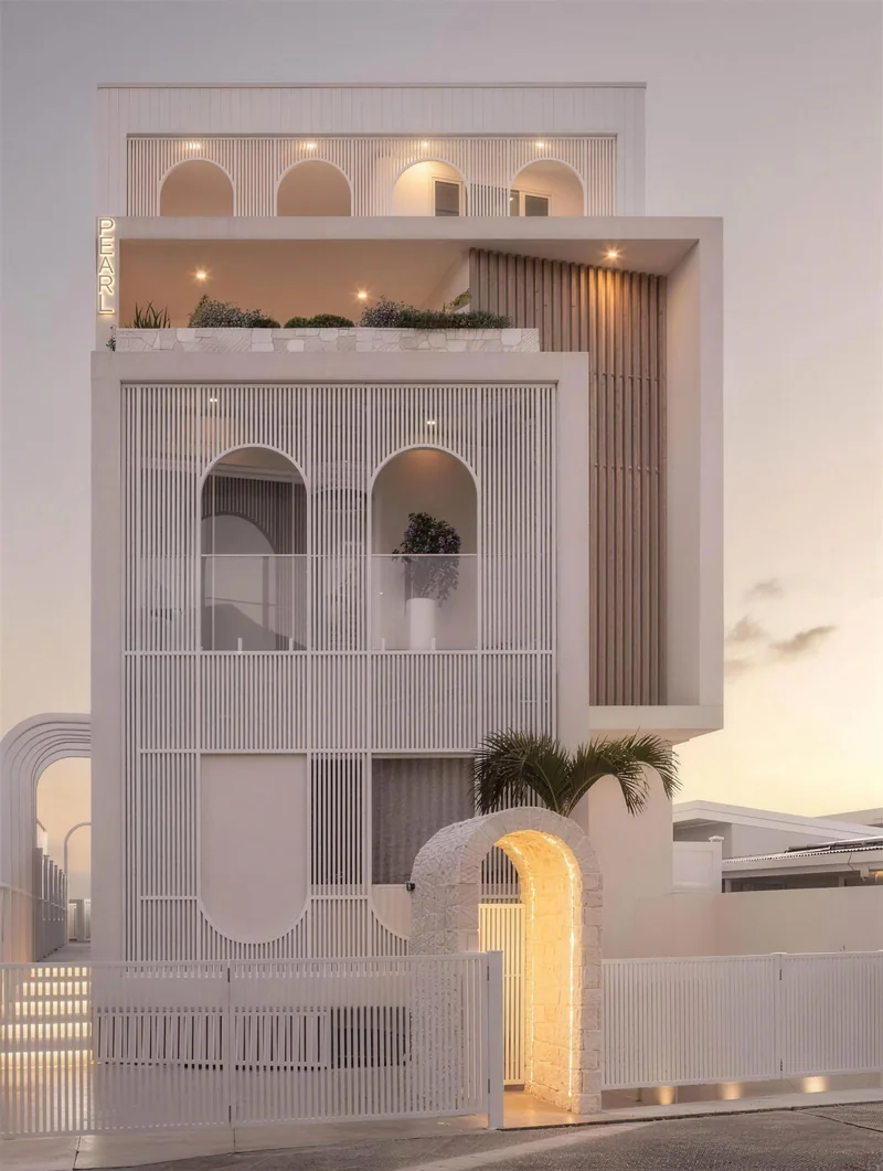 Rendered two-storey home with palms and a lawn